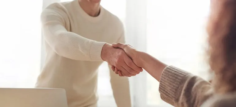 people shaking hands