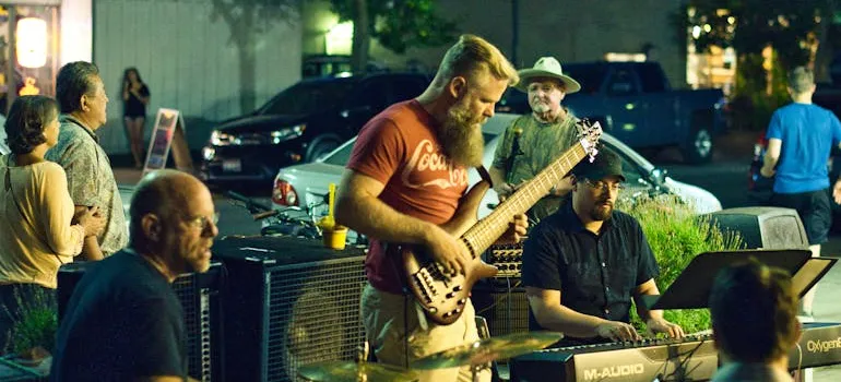 A band playing the music.