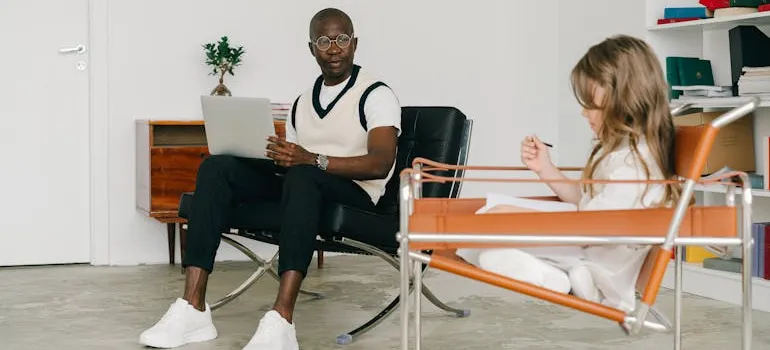 A child talking to a therapist