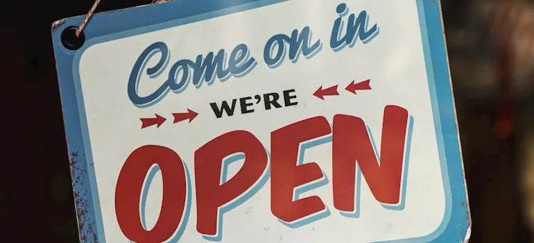 A picture of an "Open" sign.
