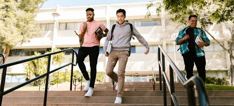 students going to class after discussing the pros and cons of living in Olney as a teenager