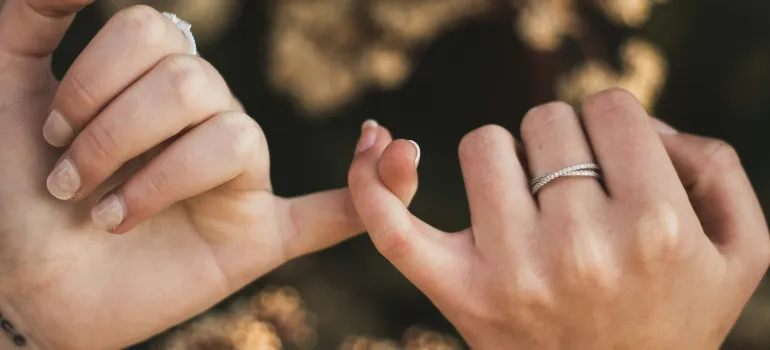 People holding fingers.