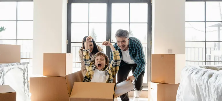 A happy family in their new home after relocation.