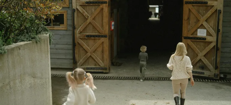 Kids in a barn.